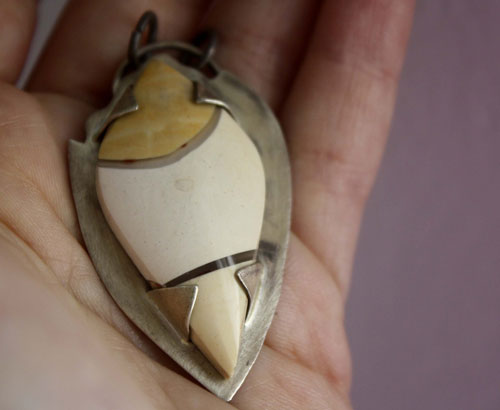 Metaphysical, mystery of nature pendant in silver and breccia mookaite jasper
