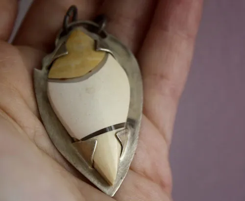 Metaphysical, mystery of nature pendant in silver and breccia mookaite jasper