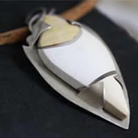 Metaphysical, mystery of nature pendant in silver and breccia mookaite jasper