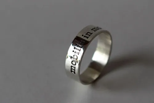 Mobilis In Mobile, quote from twenty thousand leagues Under the sea ring in silver