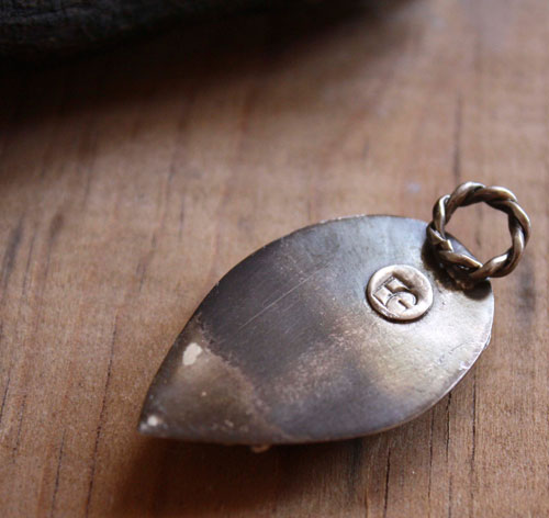 Monsoon, duality of nature pendant in silver and serpentine