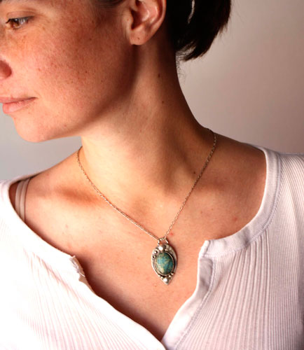 Monsoon, duality of nature pendant in silver and serpentine