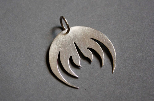 Magma, rock band logo pendant in sterling silver