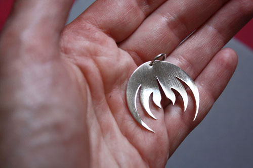 Magma, rock band logo pendant in sterling silver