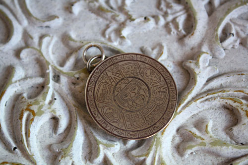 Mesoamerica, Pre-Hispanic Aztec and Maya calendar pendant in silver