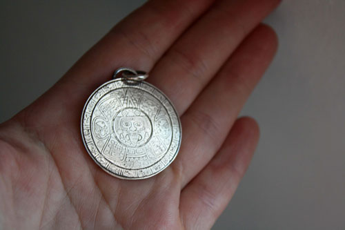 Mesoamerica, Pre-Hispanic Aztec and Maya calendar pendant in silver
