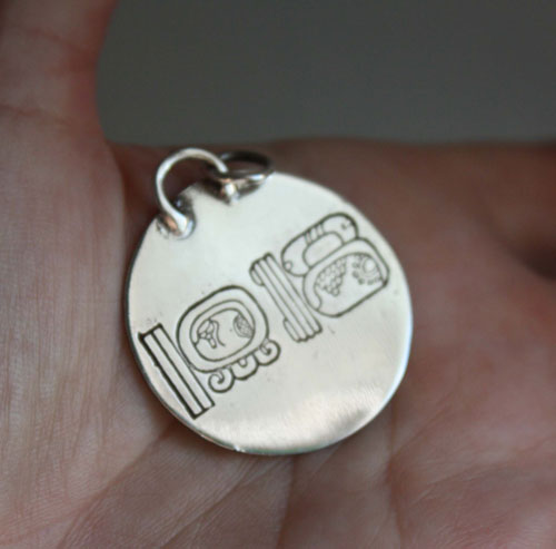 Mesoamerica, Pre-Hispanic Aztec and Maya calendar pendant in silver