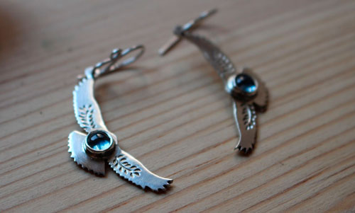 Messages at dawn, eagle earrings in sterling silver and blue zircon