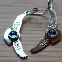 Messages at dawn, eagle earrings in sterling silver and blue zircon