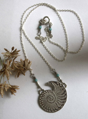 Nautilus, seashell of stability and endurance necklace in silver and turquoise