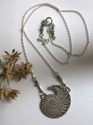 Nautilus, seashell of stability and endurance necklace in silver and turquoise