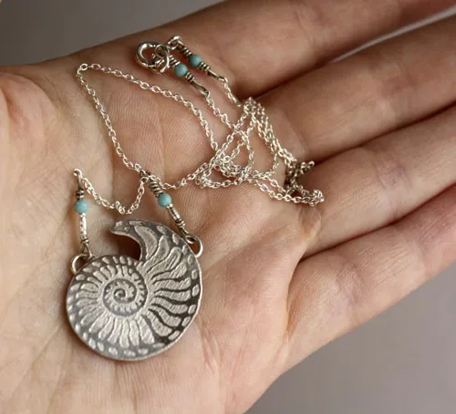Nautilus, seashell of stability and endurance necklace in silver and turquoise