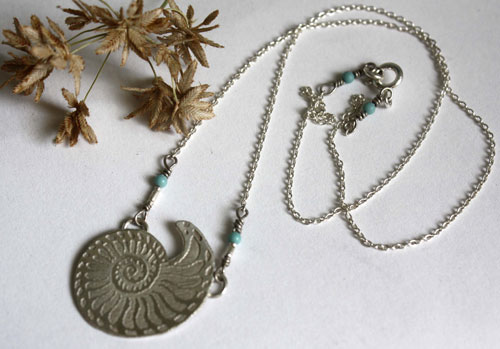 Nautilus, seashell of stability and endurance necklace in silver and turquoise