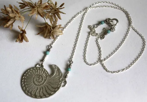 Nautilus, seashell of stability and endurance necklace in silver and turquoise