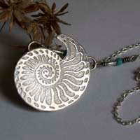 Nautilus, seashell of stability and endurance necklace in silver and turquoise