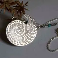 Nautilus, seashell of stability and endurance necklace in silver and turquoise