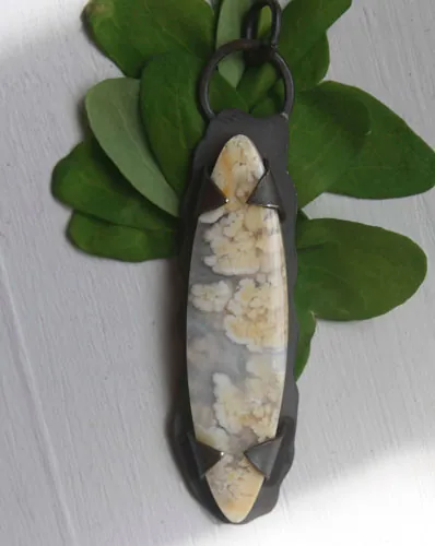 Nebulous, suspended universe pendant in silver and Graveyard Point Plume agate