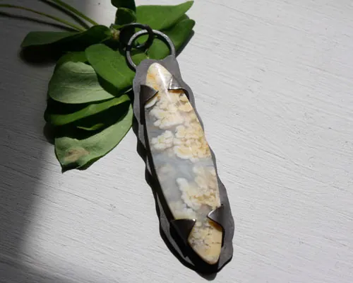 Nebulous, suspended universe pendant in silver and Graveyard Point Plume agate