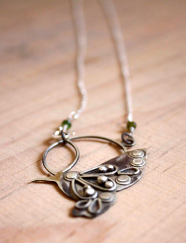 Nectar, hummingbird necklace in silver and green sapphire