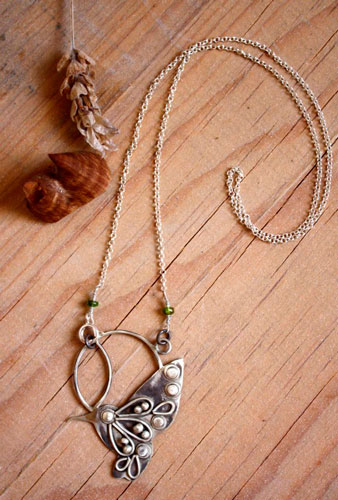 Nectar, hummingbird necklace in silver and green sapphire