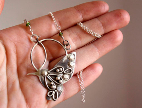 Nectar, hummingbird necklace in silver and green sapphire