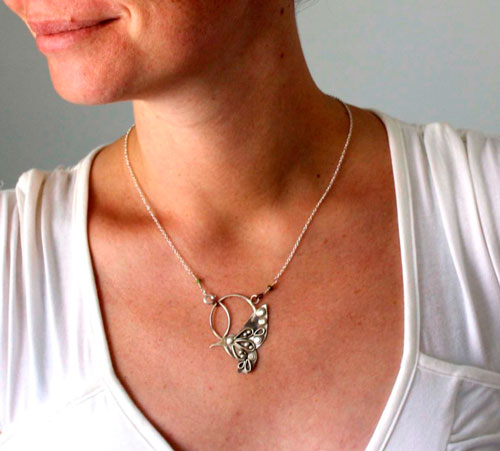 Nectar, hummingbird necklace in silver and green sapphire