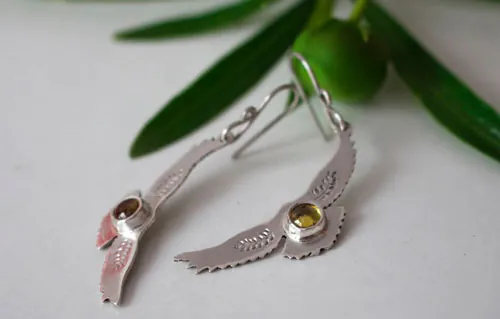 Ode to the sun, Native American eagle earrings in silver and yellow zircon