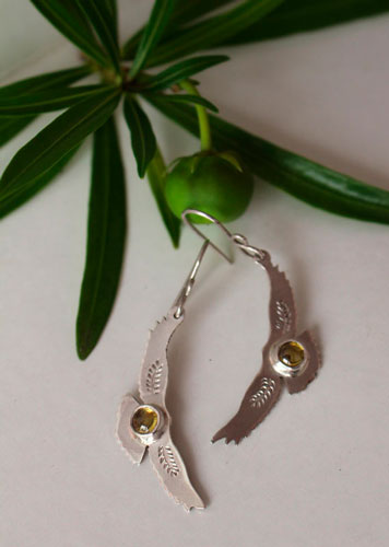 Ode to the sun, Native American eagle earrings in silver and yellow zircon