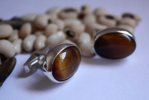 Ojo de León, animal eye cufflinks in sterling silver and Tiger’s Eye