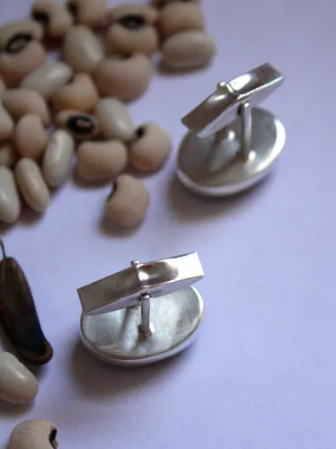 Ojo de León, animal eye cufflinks in sterling silver and Tiger’s Eye