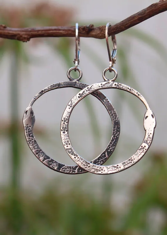 Ouroboros, snake earrings in silver