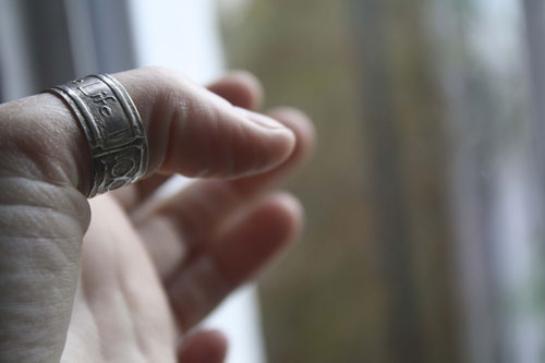 One Love, lyrics from U2’s rock anthem One ring in silver