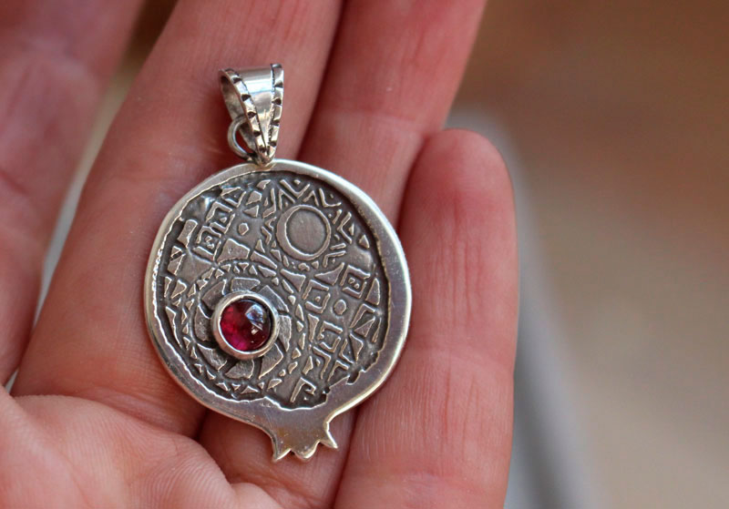 Persephone with pomegranate, Greek legend pendant in silver and garnet