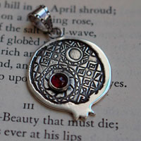 Persephone with pomegranate, Greek legend pendant in silver and garnet