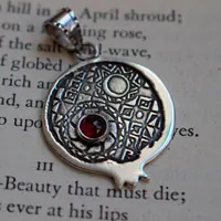 Persephone with pomegranate, Greek legend pendant in silver and garnet