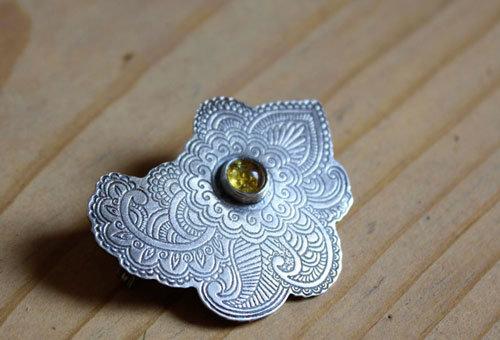 Persian moon, silk road brooch in silver and amber