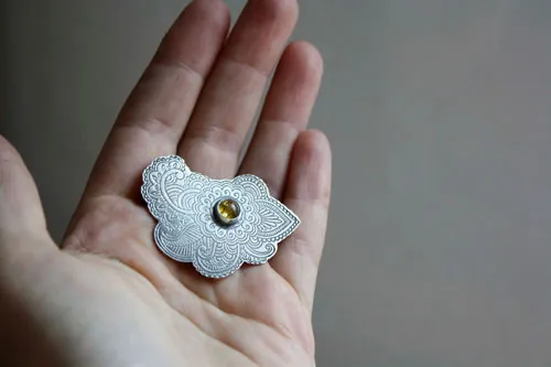 Persian moon, silk road brooch in silver and amber