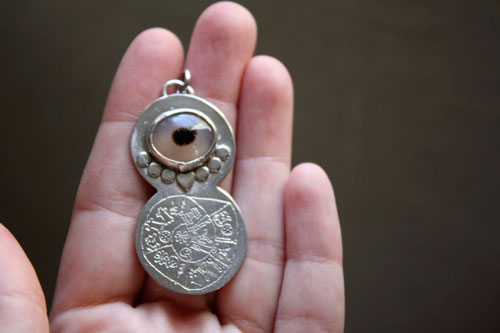 Phaistos, Minoan Phaistos disc pendant in silver and dendritic agate