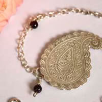 Poem of the earth, Cashmere drop anklet and bracelet in silver and garnet