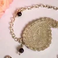 Poem of the earth, Cashmere drop anklet and bracelet in silver and garnet