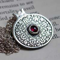 Persephone, pomegranate necklace in silver and garnet