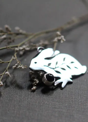 Rabbit totem, Native American spirit guide pendant in silver and onyx