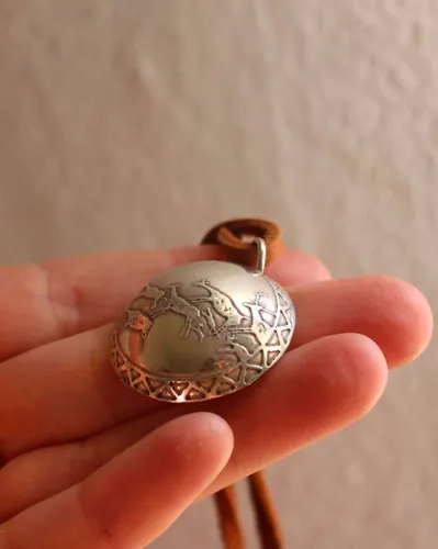 Rock Art, Prehistoric hunting scene necklace in silver