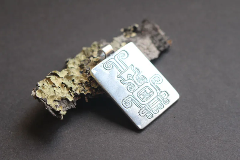 Sacred fire, Mexican Aztec glyph necklace in silver