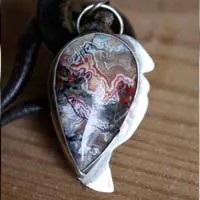 Sayap, dragon wing pendant in silver and Mexican Crazy Lace agate