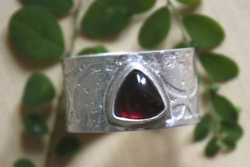 Sherlock Holmes, neo-Victorian steampunk gear ring in silver and garnet