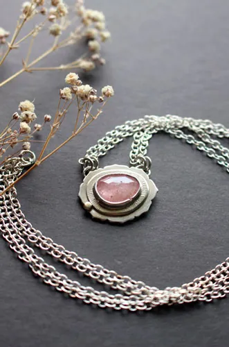 Supernova sapphire, astronomy necklace in silver, gold, and pink sapphire