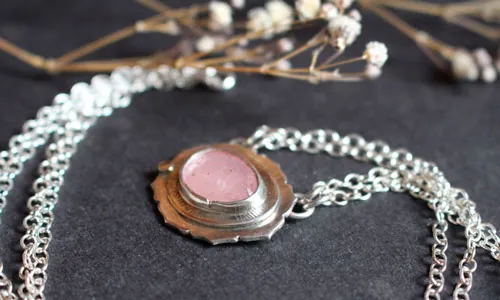 Supernova sapphire, astronomy necklace in silver, gold, and pink sapphire