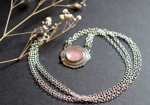 Supernova sapphire, astronomy necklace in silver, gold, and pink sapphire