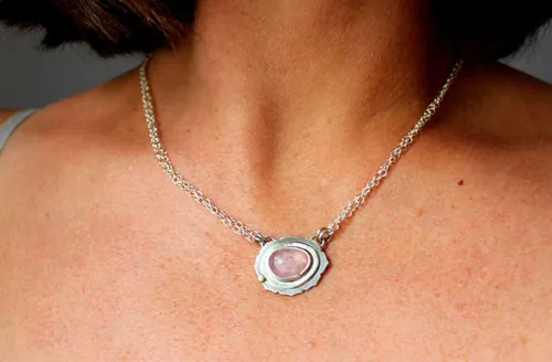 Supernova sapphire, astronomy necklace in silver, gold, and pink sapphire